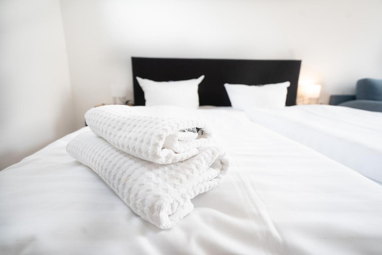 Hotel Zur Alten Stadtkellerei Leipzig Eksteriør bilde A bed with a duvet